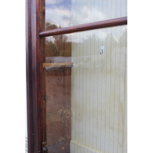 22 - An unusual antique oak display cabinet with 2 pairs of glazed doors and 2 slim drawers, approx 143cm... 