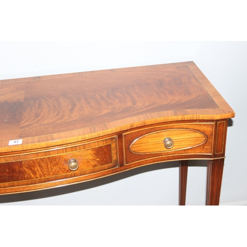 43 - A Georgian style serpentine mahogany hall table with 3 drawers, approx 137cm wide x 51cm deep x 86cm... 