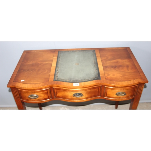 44 - A Georgian style serpentine mahogany desk with gilt leather inset and 3 drawers, approx 94cm wide x ... 