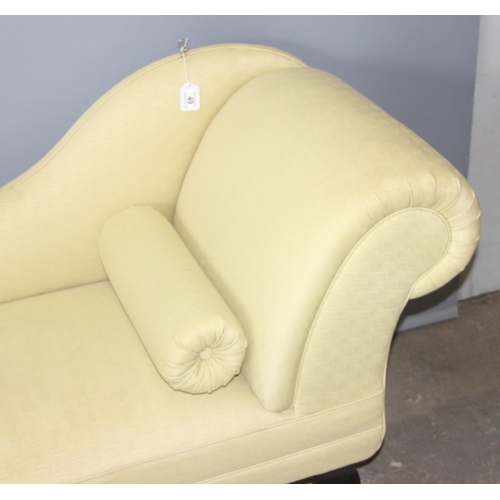 49 - A modern yellow upholstered chaises longue with matching cushion, approx 160cm wide x 60cm deep x 85... 