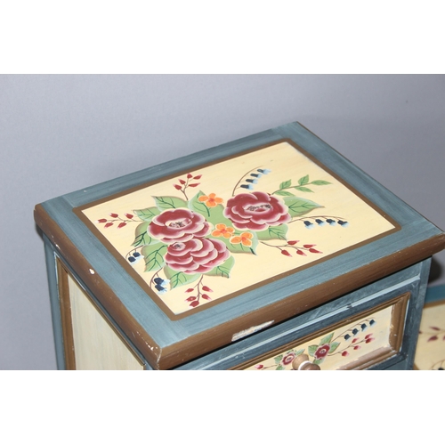 56 - A floral painted 7 drawer chest of drawer and a similar 2 drawer floral painted bedside cabinet, the... 