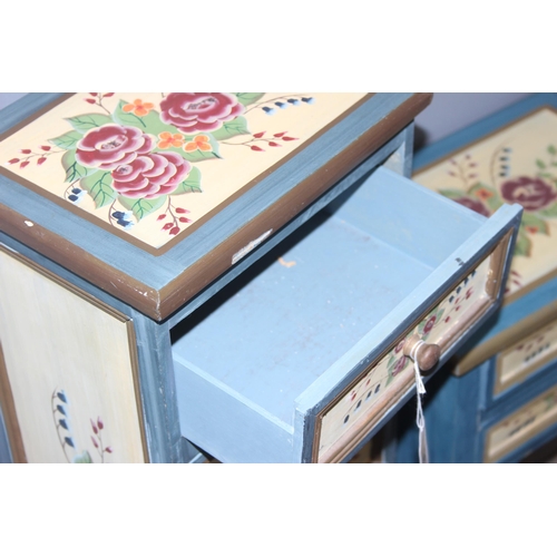 56 - A floral painted 7 drawer chest of drawer and a similar 2 drawer floral painted bedside cabinet, the... 