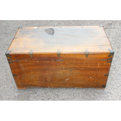 94 - A late 19th or early 20th century Chinese camphorwood campaign or shipping trunk with brass bound at... 