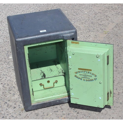 107 - A vintage Whitfield's cast iron safe with key, approx 42cm wide x 46cm deep x 58cm tall