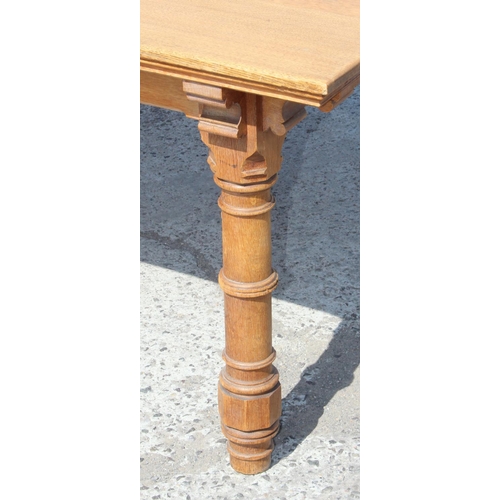 108 - An extremely impressive Gothic Revival style light oak library table with turned legs, approx 216cm ... 