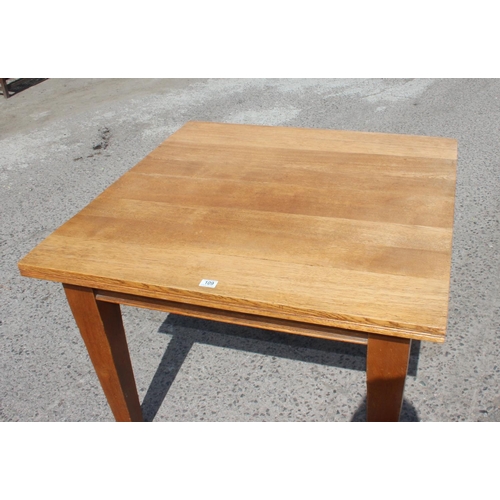 109 - An unusual retro style light oak square library table, approx 104cm wide x 103cm deep x 75cm tall