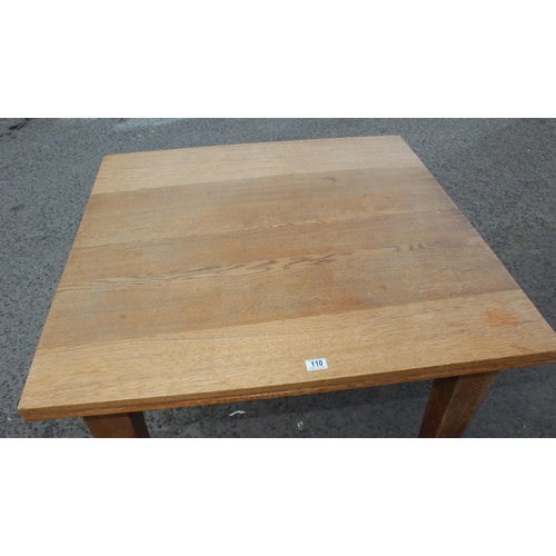 110 - An unusual retro style light oak square library table, approx 104cm wide x 103cm deep x 75cm tall