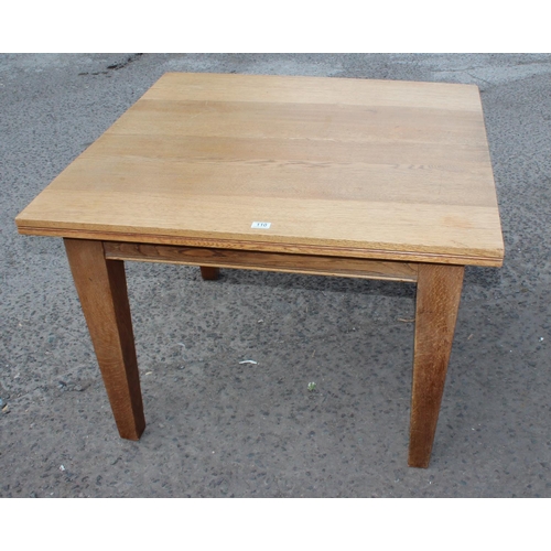 110 - An unusual retro style light oak square library table, approx 104cm wide x 103cm deep x 75cm tall