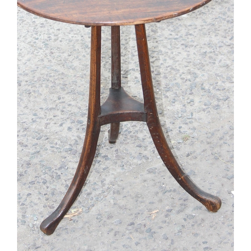 111 - A small antique wooden tilt top mahogany table with unusual tripod base, approx 55cm in diameter