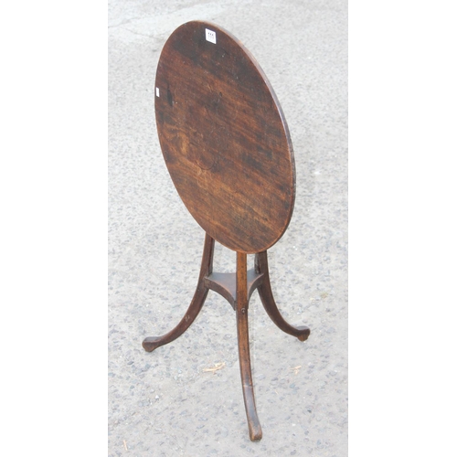 111 - A small antique wooden tilt top mahogany table with unusual tripod base, approx 55cm in diameter