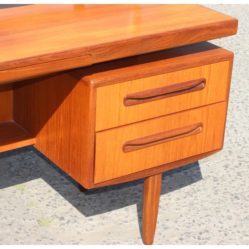 2 - A retro mid-century G-Plan dressing table with mirror, approx 155cm wide x 120cm tall