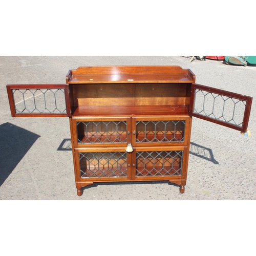 57 - A vintage Globe Wernicke style mahogany bookcase with leaded glass opening doors, approx 89cm wide x... 