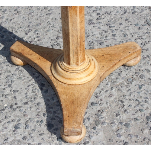 59 - An early 20th century light oak Gothic revival side table of octagonal form, approx 48cm wide x 75cm... 