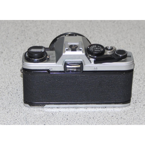 655 - An Olympus OM2000 camera with Zeiss F=35-70mm 1:3.5-4.8 lens, with case and an Olympus OM10 camera b... 