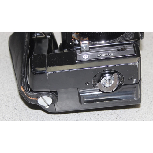 657 - A Mamiya M645 J camera with Mamiya Sekor 1:2.8 f=80mm lens, a further 1:2.8 f=45mm lens, in canvas c... 