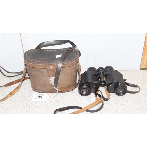 667 - Pair of 8x30 binoculars marked in Russian with case marked made in USSR