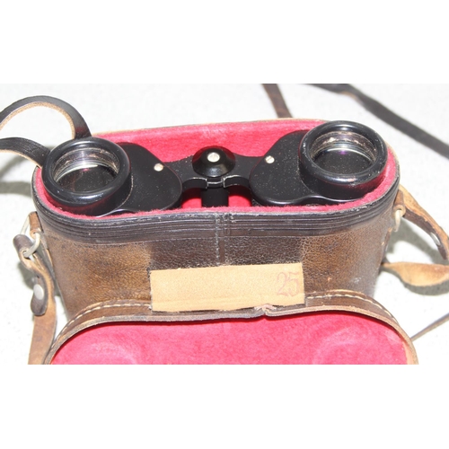 667 - Pair of 8x30 binoculars marked in Russian with case marked made in USSR