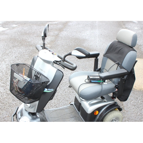 701 - Kymco Foru mobility scooter in silver, with keys, battery and charger