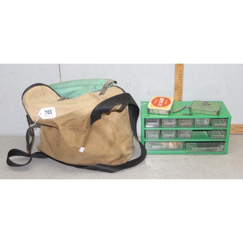 703 - Canvas bag with fishing contents, incl flies and winders