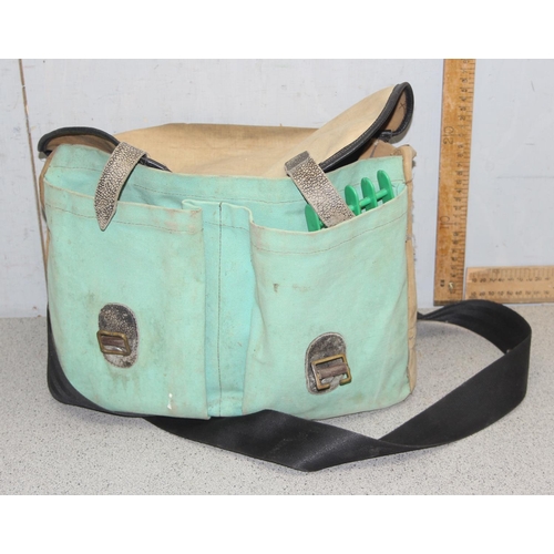 703 - Canvas bag with fishing contents, incl flies and winders