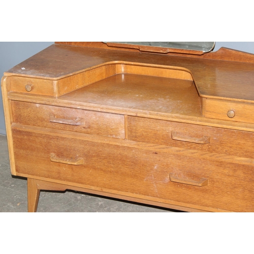 72 - A retro G-Plan dressing table with mirror and 5 drawers, approx 106cm wide x 46cm deep x 141cm tall