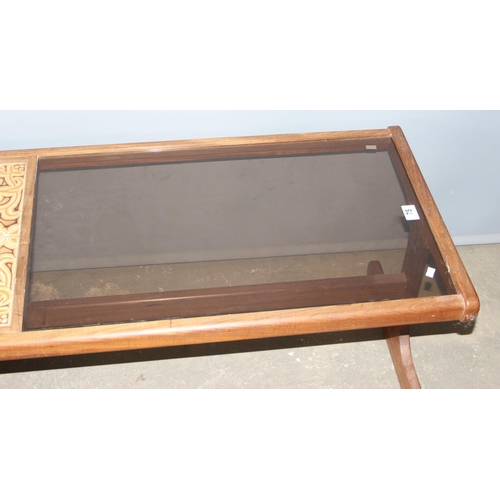 75 - A retro G-Plan teak coffee table with retro tiles and smoked glass, approx 121cm wide x 49cm deep x ... 