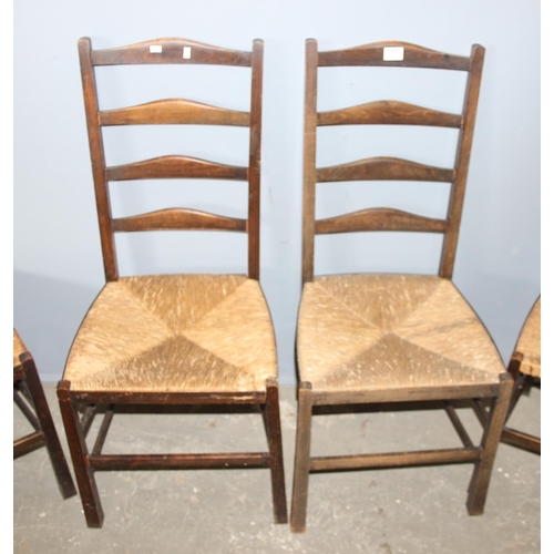 77 - A set of 4 Arts & Crafts period rush seated chairs