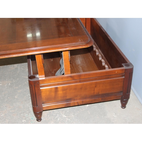 78 - An unusual Richelieu mahogany coffee table with rising top and storage under, approx 129cm wide x 85... 