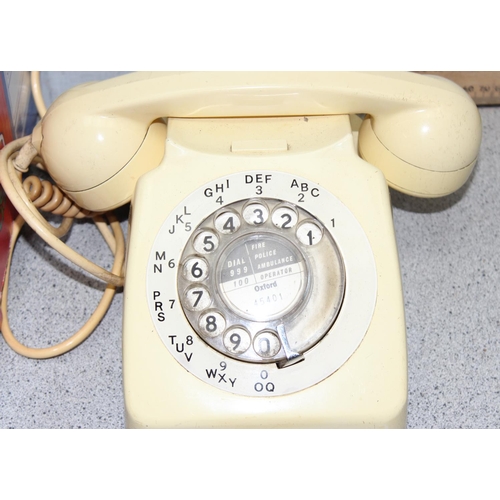 664 - Cream coloured vintage telephone and a qty of TV aerial cables