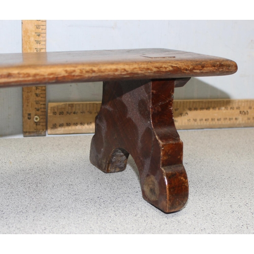 67 - A long antique low wooden foot stool or rest, approx 88cm wide