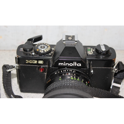 665 - Minolta XG9 camera with spare lens in carry case