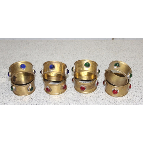 1831 - Set of 8 vintage brass & glass jewelled napkin ring holders.