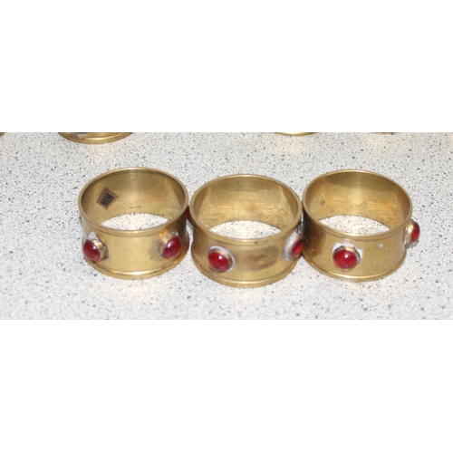 1831 - Set of 8 vintage brass & glass jewelled napkin ring holders.