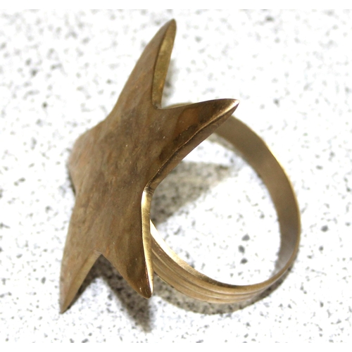 1833 - Set of 6 brass star shaped napkin ring holders with hammered finish.