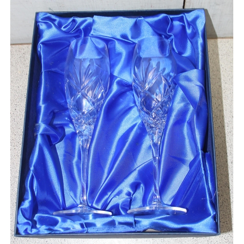 1834 - 2 boxed pairs of Doulton International cut crystal Champagne flutes