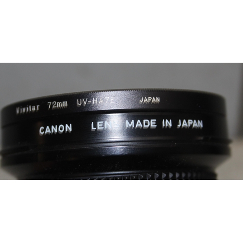 668 - Cannon A-1 35mm manual camera body with battery pack, 5 interchangeable lenses to include Canon FD 5... 