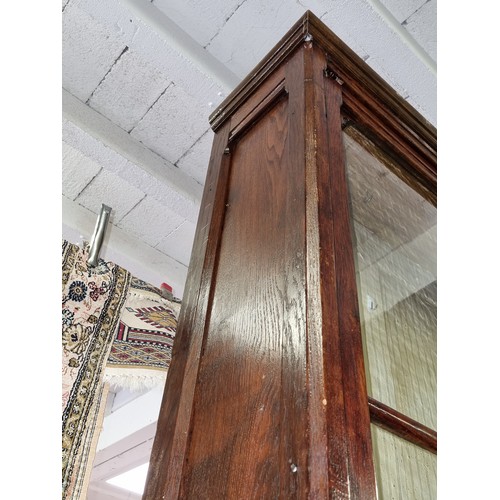 22 - An unusual antique oak display cabinet with 2 pairs of glazed doors and 2 slim drawers, approx 143cm... 