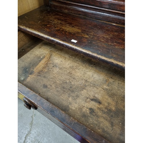 22 - An unusual antique oak display cabinet with 2 pairs of glazed doors and 2 slim drawers, approx 143cm... 