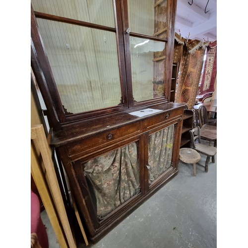 22 - An unusual antique oak display cabinet with 2 pairs of glazed doors and 2 slim drawers, approx 143cm... 