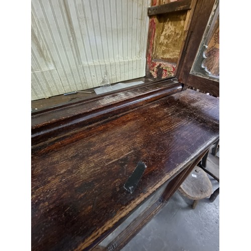 22 - An unusual antique oak display cabinet with 2 pairs of glazed doors and 2 slim drawers, approx 143cm... 