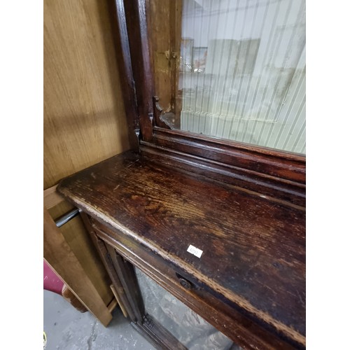 22 - An unusual antique oak display cabinet with 2 pairs of glazed doors and 2 slim drawers, approx 143cm... 