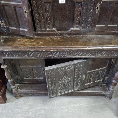 34 - Antique Jacobean style oak court cupboard, likely late 19th century, approx 105cm wide x 58cm x 126c... 