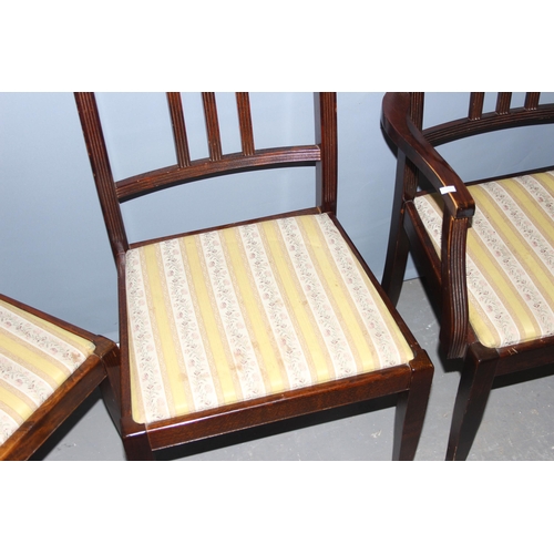 41 - A set of 4 antique style mahogany dining chairs with spade legs, 3 dining and one carver