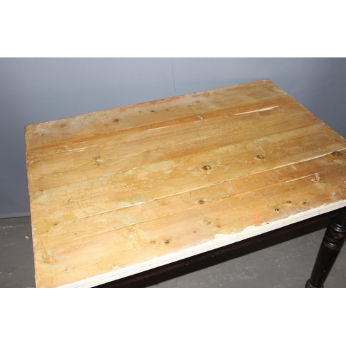 37 - An antique stained pine farmhouse kitchen table with turned legs and drawer, approx 107cm wide x 78c... 