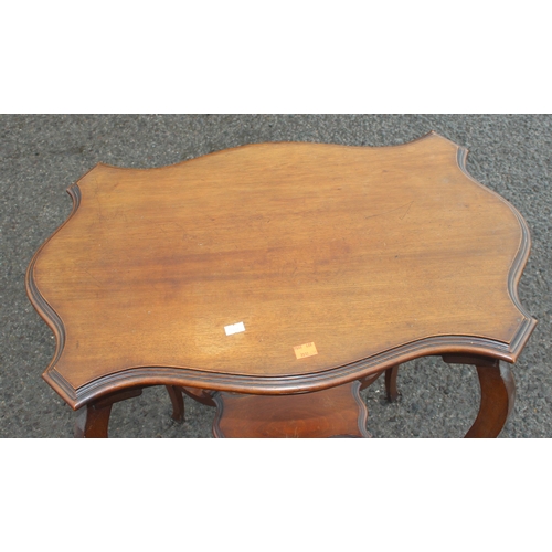 33 - An Edwardian mahogany lamp table with shaped top, approx 64cm wide x 42cm deep x 72cm tall