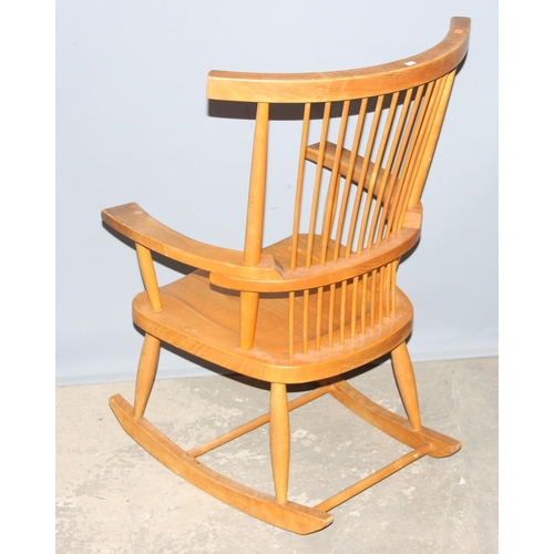 20 - An unusual heavy bespoke made Brutalist style retro rocking chair with solid elm seat and comb back,... 