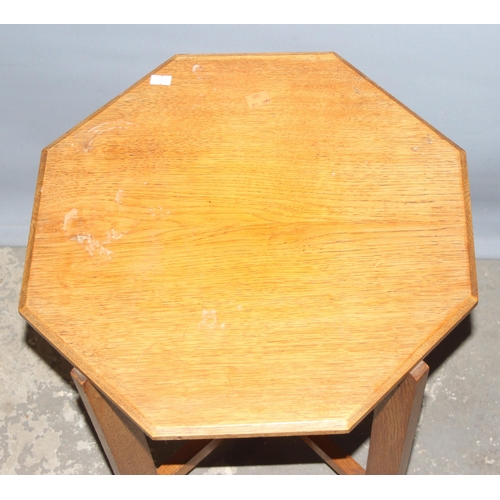 17 - A small vintage Octagonal oak side table, paper label under stating 