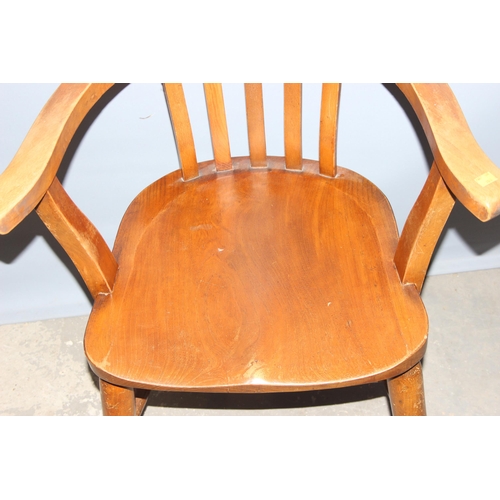 40 - A vintage wooden captain's chair or desk chair with elm seat