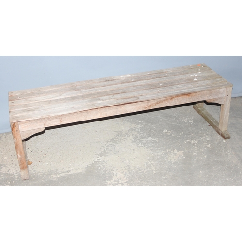 301 - A weathered slatted teak garden bench by Barlow Tyrie of Braintree, approx 149cm wide x 56cm deep x ... 