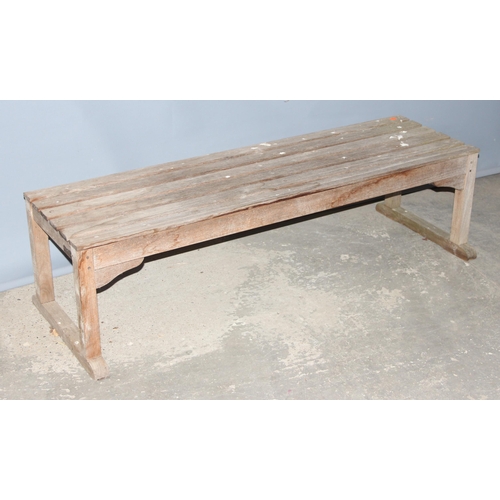 301 - A weathered slatted teak garden bench by Barlow Tyrie of Braintree, approx 149cm wide x 56cm deep x ... 